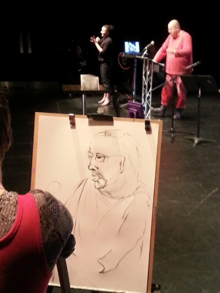 Speakers are drawn on stage by artist Tanya Raabe