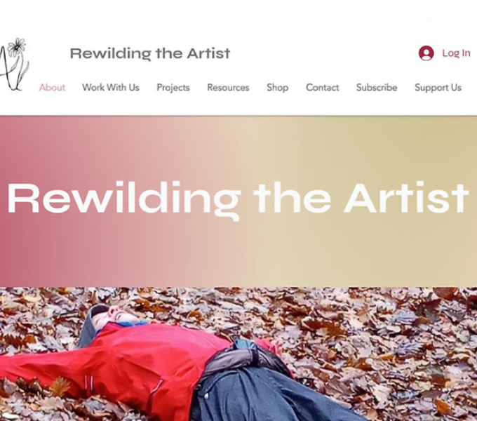 A  screen grab of the front page of the Rewilding the Artist Website. The main image is of a person lying down amongst fallen autumnal leaves.
