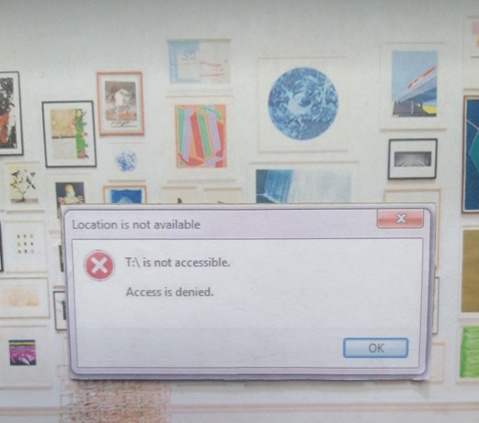 Image of a computer screen with a pop up notification that reads: this is not accessible. Access is denied.